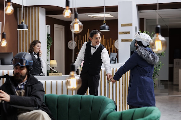 Bellboy greeting guest who booked based on email segmentation efforts - Revinate